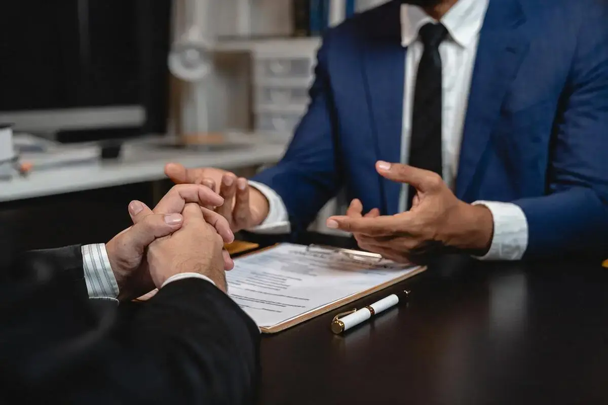 Family lawyer in Brampton listening carefully to a client during a confidential divorce and separation consultation at GSR Law